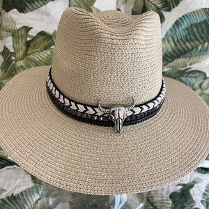 Western style hat with bull adornment